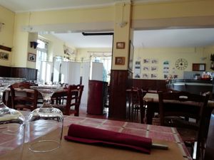 Interiors are easy and rustic   at Osteria di Filia in Castellamonte