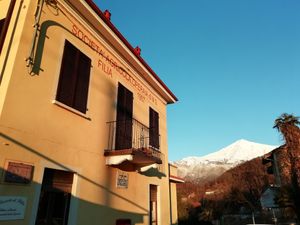 The restaurant and his beautiful location near mountains at Osteria di Filia in Castellamonte