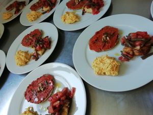 Appetizers! Capricciosa salad (vegan), Red pepper sauce on homemade bread, green beans salad at Osteria di Filia in Castellamonte