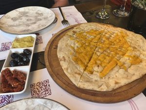 Vegan Garlic cheese bread that cones out with every meal   at Cozy Alanya in Alanya