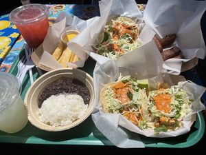 Tofu tacos no crema, rice and beans, plantains, yucca fries, strawberry agua fresca  at Cholita Linda in San Francisco