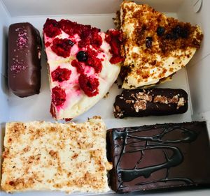 A box of sweet pastries to tide us over for a few days. How long will they last? I give them a lifespan of three days, maximum! at Little Bear in Pireas