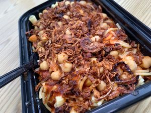 Koshary: Rice, Brown Lentils, Chickpeas & Pasta w/ Tomato Sauce, topped with Fried Onions at Cairo's Kitchen in Kalamazoo