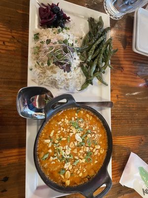Peanutbutter Siracha chickpea curry with orange marmalade glazed green beans and pickled blueberries    at Pimiento Tea Room in Holly Springs