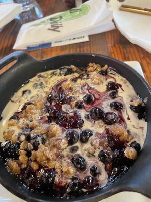 Blueberry cobbler with vegan vanilla cream added   at Pimiento Tea Room in Holly Springs
