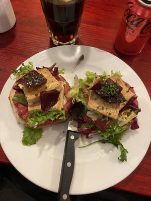 Bagel with beetroot hummus, tofu and beetroot   at Milk in Barcelona