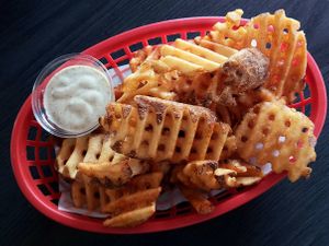 Waffle fries with vegan ranch dip at Tom's Pizza in Seoul