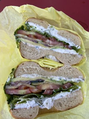 Veggie bagel sandwich on onion bagel with chive cream cheese. PERFECTION!!!  at Ben & Esther's Vegan Jewish Deli in Portland