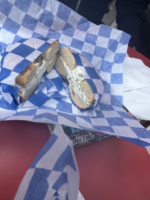 Bagel with chive cream cheese  at Ben & Esther's Vegan Jewish Deli in Portland