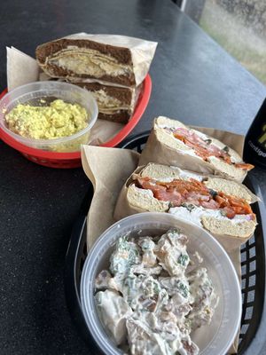 Siegler Sammy with egg salad (left), LOX bagel with loaded baked potato salad (right) at Ben & Esther's Vegan Jewish Deli in Portland