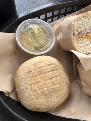 Potato knish with mustard   at Ben & Esther's Vegan Jewish Deli in Portland
