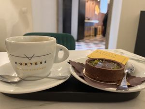 Pastry with coffee   at Cortese Café 900 in Florence