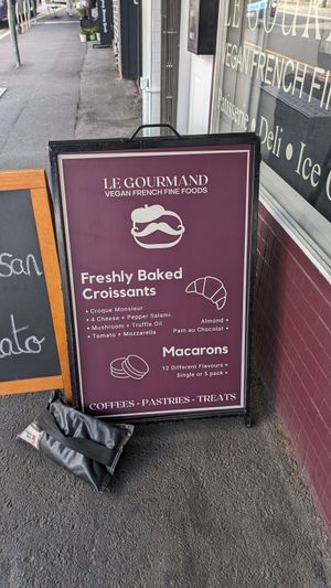The sign and offerings at Le Gourmand in Newtown