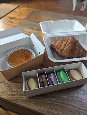 Creme brulee, croissant with tomato and cheese and macarons at Le Gourmand in Newtown