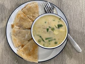 Fried roti with green curry, 118 baht  at Khun Churn in White in Bangkok