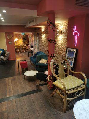 Cozy indoor seating at Emilie and the Cool Kids in Cannes