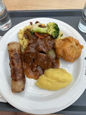 Soy goulash, rice, fried cauliflower, mashed potatoes   at Loving Hut - OC Nový Smíchov in Prague