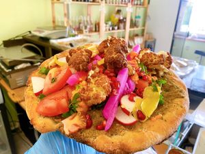 Baked falafel 0 oil z kalafiorem I granatem  at Falafel Bejrut in Warsaw