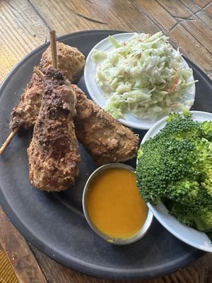 Vegan drumsticks with two sides—Coleslaw and broccoli   at Imagine Vegan Cafe in Memphis