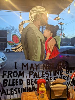 Window art at Imagine Vegan Cafe in Memphis
