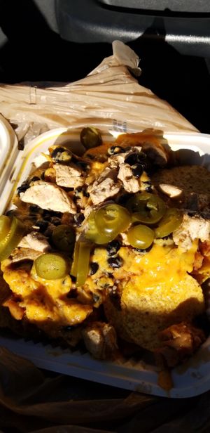 Vegan bbq nachos and we added faux chicken and black beans :) at Imagine Vegan Cafe in Memphis