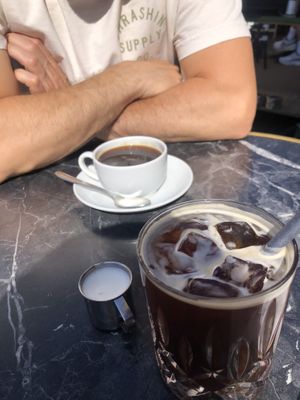 Americano and iced decaf version with oat milk   at ST. LOUIS The Breakfast Company in Cologne