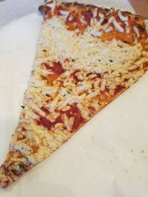 plain vegan Daiya slice, well done, nice and crispy   at Purgatory Pizza in Los Angeles