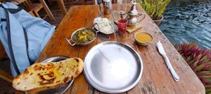 Saag paneer, daal, garlic naan, chai at Om Cafe in Bocas Del Toro