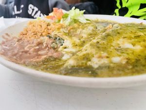 Vegan spinach and cheese enchilada platter  at Lupe's in New York City
