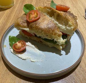 Focaccia cashew cheese, tomato, basill  at Felicia & Domingo in Lima