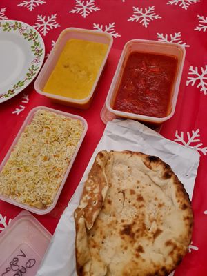 Korma, Masala, coconut rice, and naan at The Darjeeling in Bromley