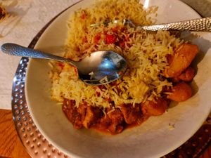 Pilau rice with a selection of curries at The Darjeeling in Bromley