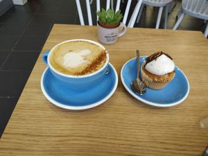 Pumpkin spice latte with a  Christmas cupcake (chestnut, maybe ?) at Cloud Cakes -  Notre Dame de Lorette in Paris