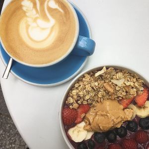Latte and acai bowl. at Cloud Cakes -  Notre Dame de Lorette in Paris