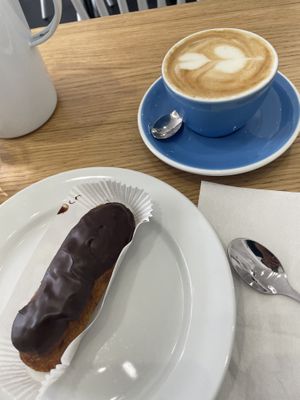 Éclair and cappuccino   at Cloud Cakes -  Notre Dame de Lorette in Paris