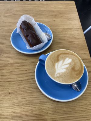 Éclaire and cappuccino   at Cloud Cakes -  Notre Dame de Lorette in Paris