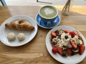 Pistache macarons (really good!! I ate a lot of macarons in Paris before going vegan, these did not disappoint!) Great croissant and delicious pancakes and matcha latte. 10/10  at Cloud Cakes -  Notre Dame de Lorette in Paris