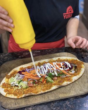 Veganer Lahmacun mit gegrillten Auberginen, Walnüssen, Salat und veganer „Jogurt“-Soße für 8€ at Yufkam & Co. Spezialitäten in Mannheim