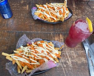 Papas con alioli    at Lado V in Buenos Aires