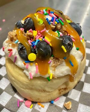 Chai Frosting, Blueberries, Pie Crumble, Sprinkles, and Caramel Sauce at Cinnaholic - High Park in Toronto