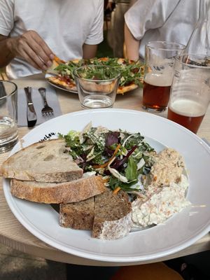 Salads from the buffet. On the background pepperoni pizza. All vegan.  at ChouChou in Stockholm