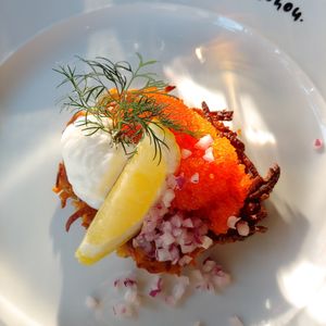 Vegan caviar on fried potatoes and cream at ChouChou in Stockholm