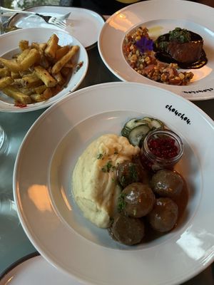 Fries (ask for their truffle mayo to dip it with ), Swedish meatballs, and chunk steak entree   at ChouChou in Stockholm