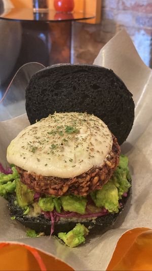 Burger with beetroot/mushroom/oat patty, vegan cream cheese, avocado and pickled veggies. Delicious   at SUSU Vegan Mylk Bar Penang in Penang