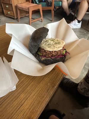 Vegan burger with cheese and avocado   at SUSU Vegan Mylk Bar Penang in Penang