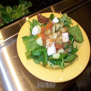 Salad bar features locally grown produce from Sweet Leaf Farm. at Holy Cow on Willamette in Eugene