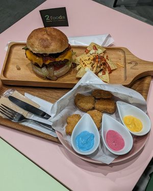 Spicy Burger comes with tacos, & nuggets with three dips at 2foods - Ginza Loft in Tokyo