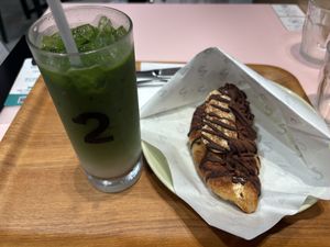 Iced matcha latte and Chocolate Banana Passionfruit Croissant  at 2foods - Ginza Loft in Tokyo