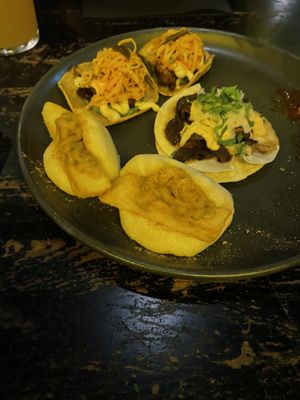 Bao buns and tacos (look orange because of the lights on the pub!)  at Wolf at the Door in Manchester