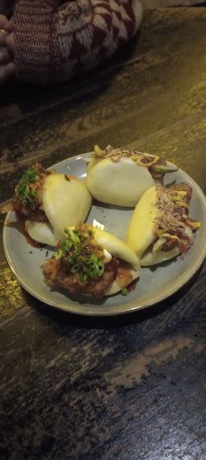 Firecracker tofu bao (left), vegan hotdog bao (right) at Wolf at the Door in Manchester